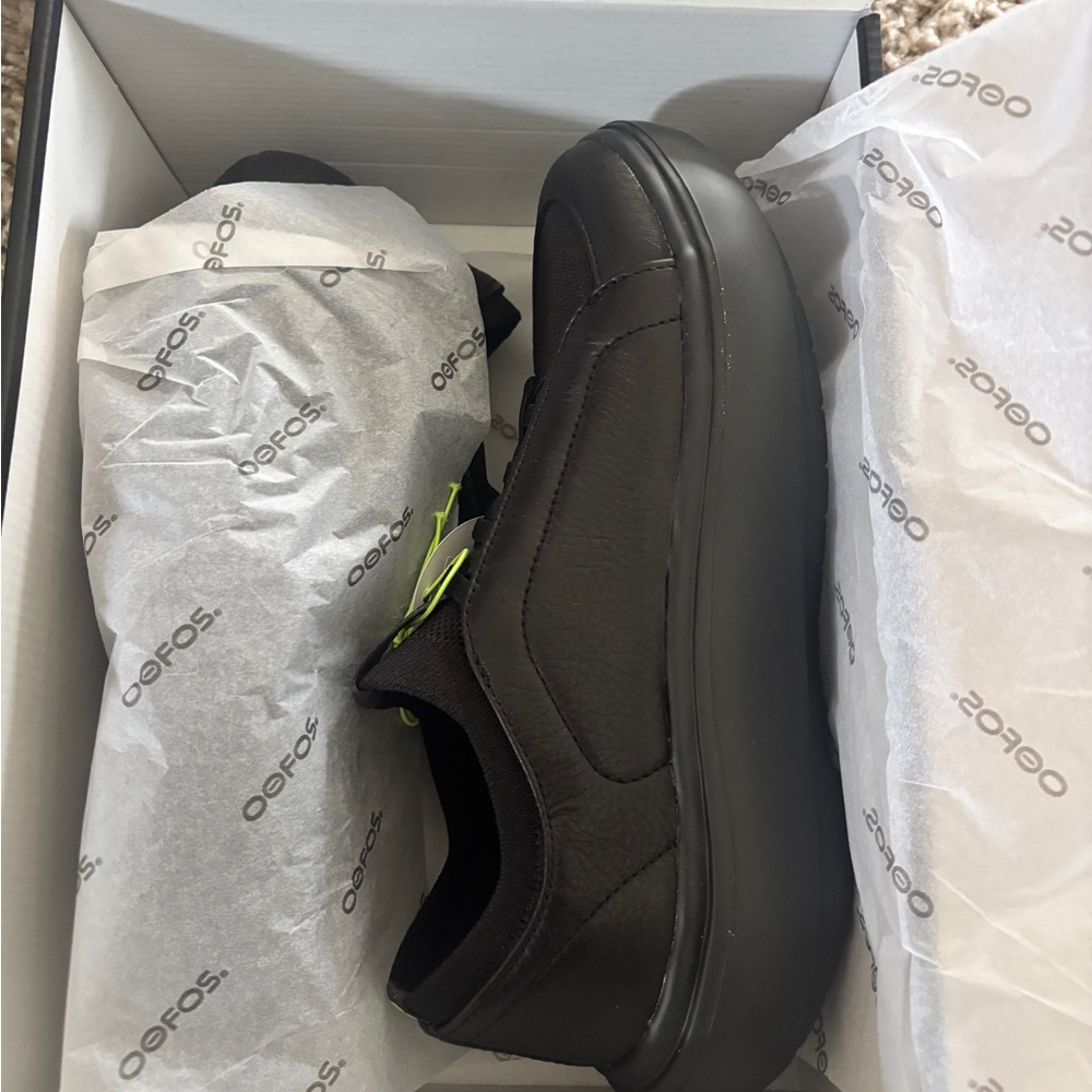 OOFOS Women's Slip-On Black Leather Casual Sneakers - Picture 3 of 7